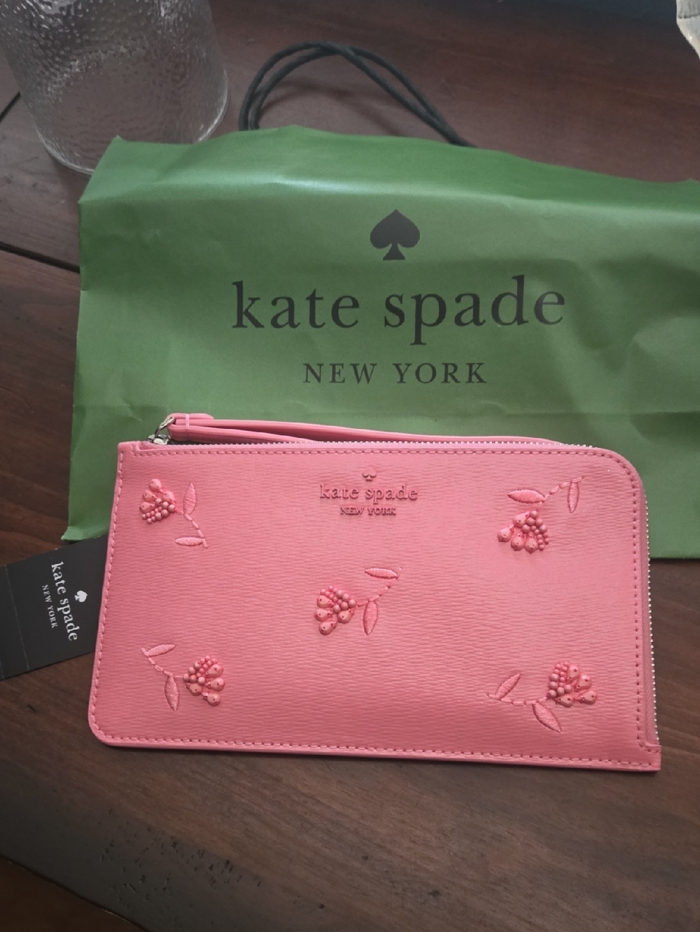 kate spade pink floral embossed zip clutch